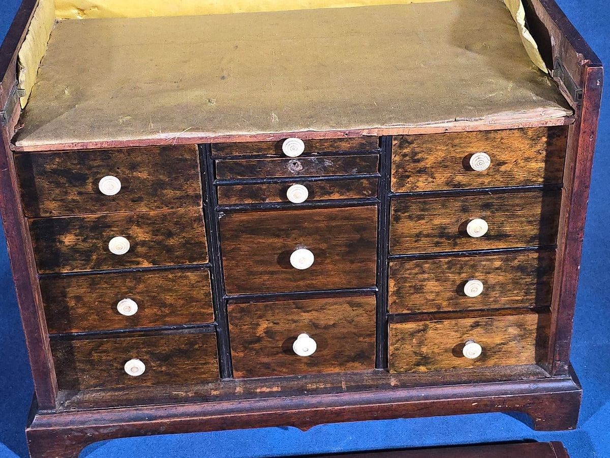 Antique Mahogany Collector's Cabinet with Silk-Lined Interior and Multiple Drawers