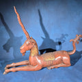 Lot 138 - Vintage Carved Wood Recumbent Unicorn Figure with Gilt Accents, 43" L x 32-3/8" H