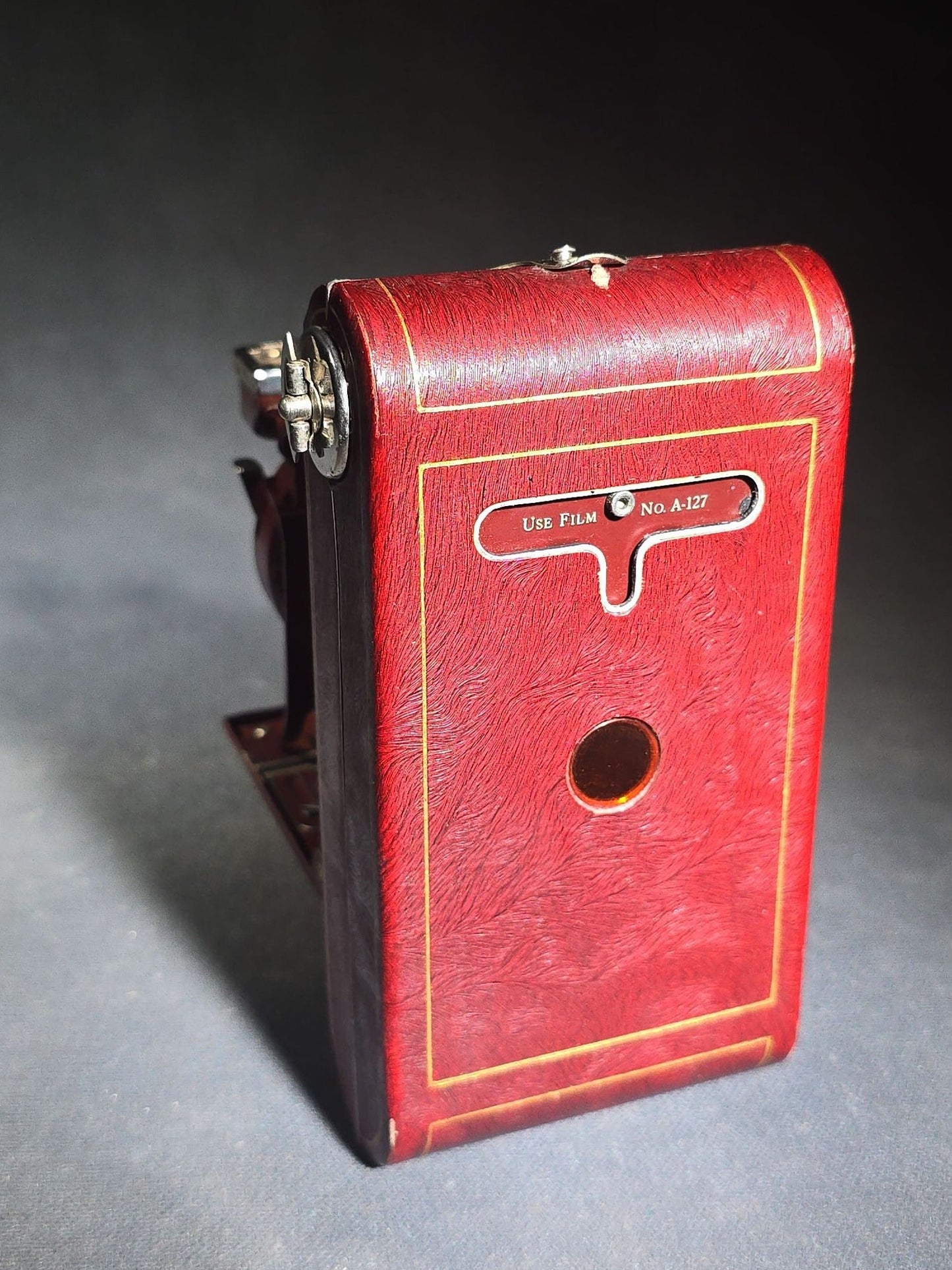 Pair of Antique and Vintage Kodak Folding Cameras including No. 1A Pocket Kodak Series II in Red with Kodak Anastigmat Lens and Kodak Retina 35mm Camera with Schneider-Kreuznach Xenar Lens, Compur-Rapid Shutter, and Leather Case