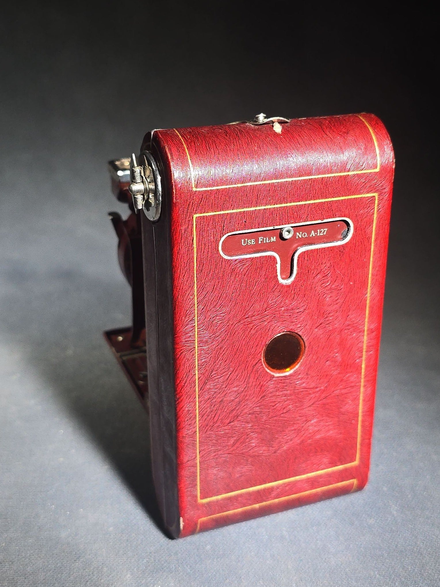 Pair of Antique and Vintage Kodak Folding Cameras including No. 1A Pocket Kodak Series II in Red with Kodak Anastigmat Lens and Kodak Retina 35mm Camera with Schneider-Kreuznach Xenar Lens, Compur-Rapid Shutter, and Leather Case