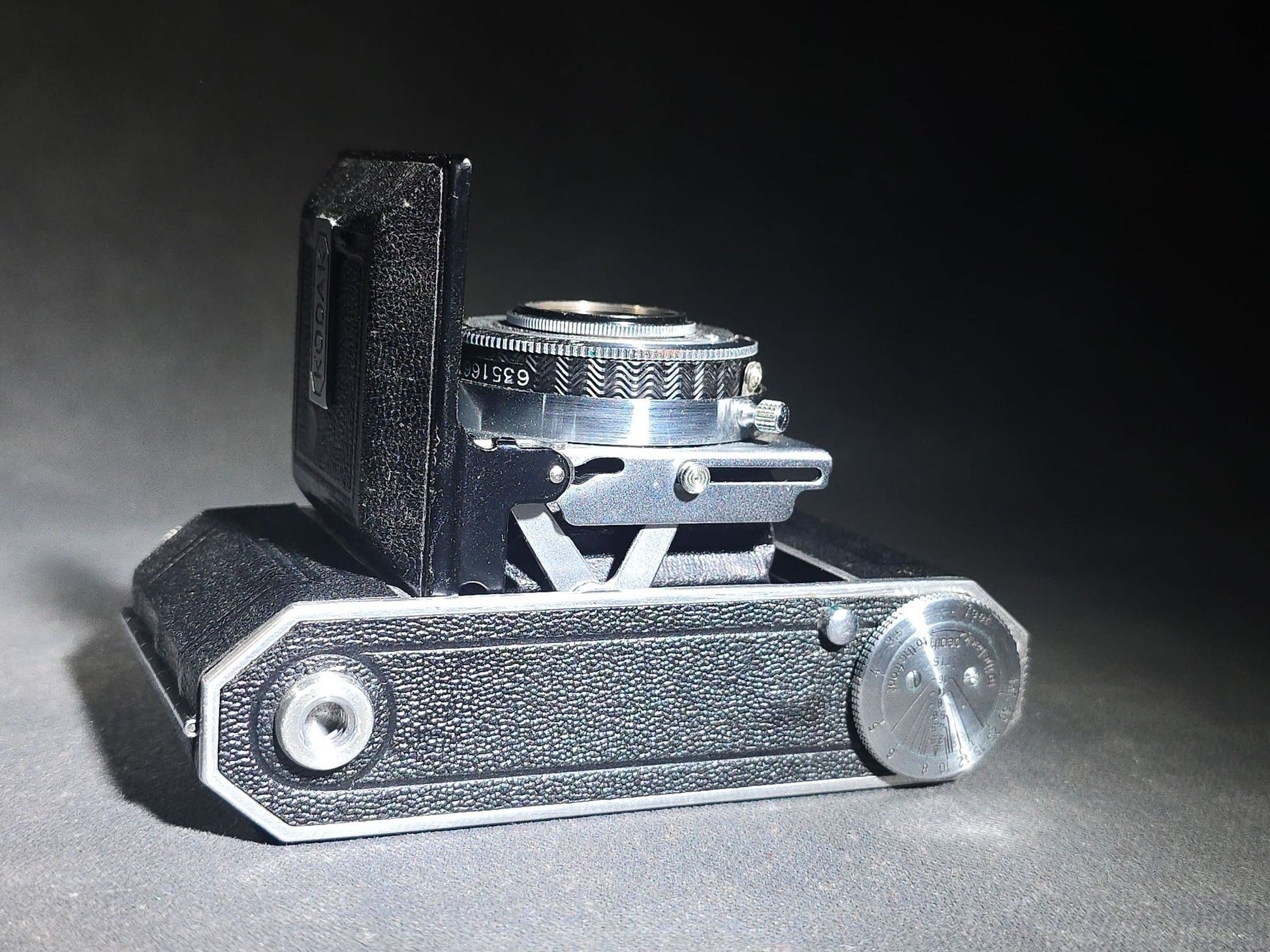 Pair of Antique and Vintage Kodak Folding Cameras including No. 1A Pocket Kodak Series II in Red with Kodak Anastigmat Lens and Kodak Retina 35mm Camera with Schneider-Kreuznach Xenar Lens, Compur-Rapid Shutter, and Leather Case
