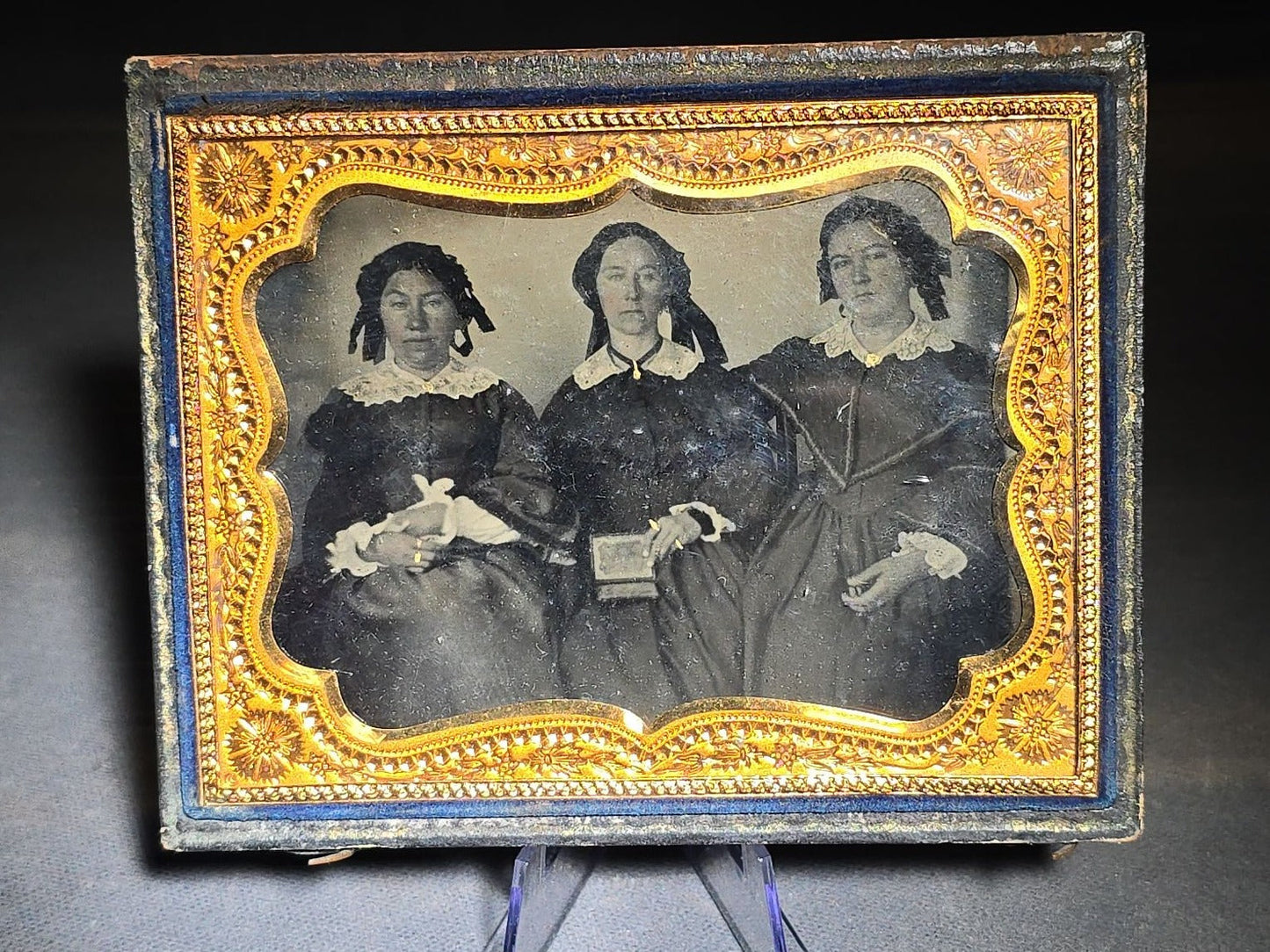 Antique 1/4th Plate Ambrotype Photograph of Three Seated Women, Center Figure Holding a Cased Image, in Full Split Leatherette Case with Blue Pillow