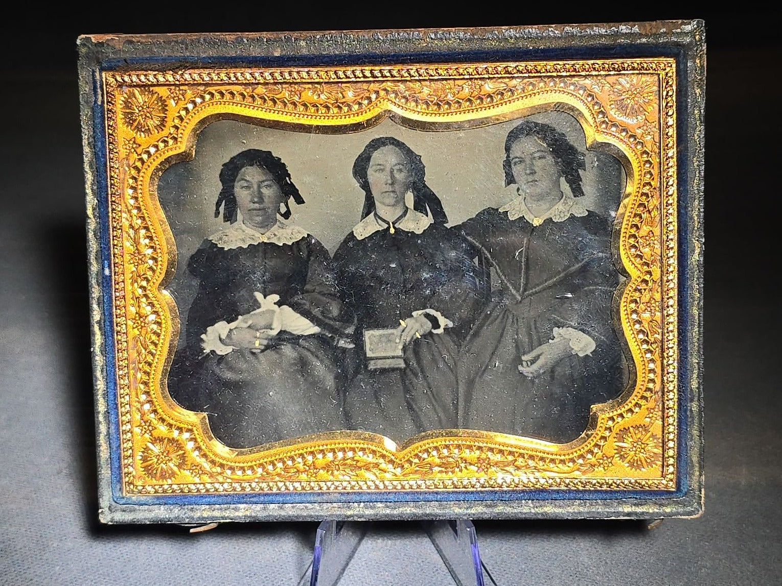Antique 1/4th Plate Ambrotype Photograph of Three Seated Women, Center Figure Holding a Cased Image, in Full Split Leatherette Case with Blue Pillow