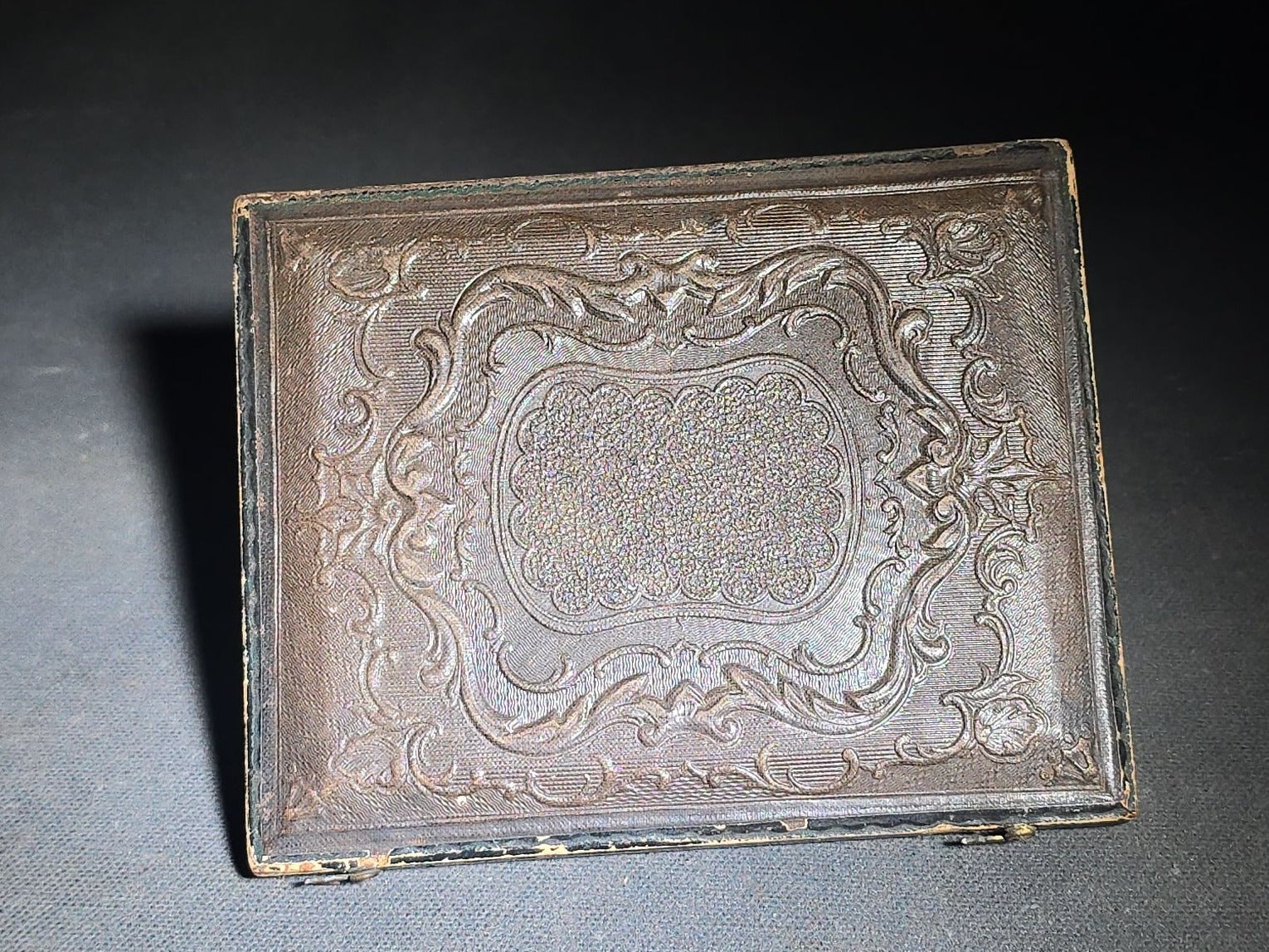 Antique 1/4th Plate Ambrotype Photograph of Three Seated Women, Center Figure Holding a Cased Image, in Full Split Leatherette Case with Blue Pillow