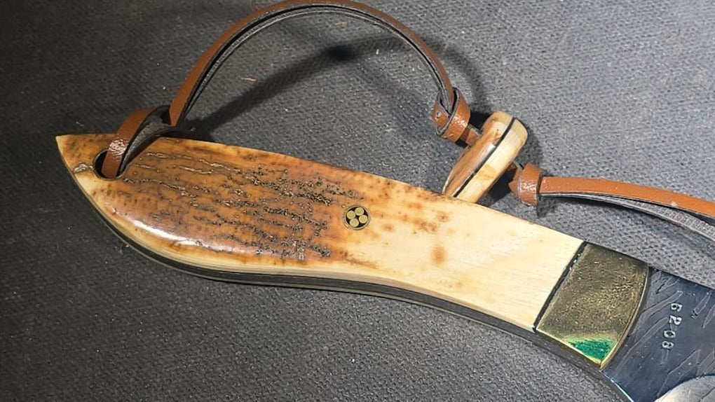 Vintage Damascus Steel Fixed-Blade Knife with Bone Handle, Brass Bolster, and Tooled Leather Sheath