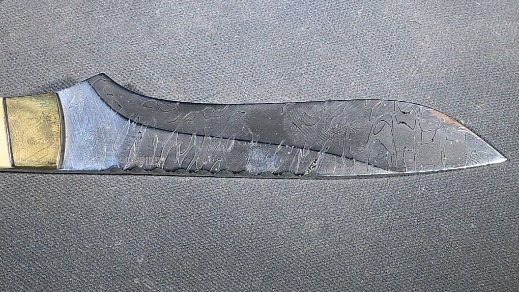 Vintage Damascus Steel Fixed-Blade Knife with Bone Handle, Brass Bolster, and Tooled Leather Sheath