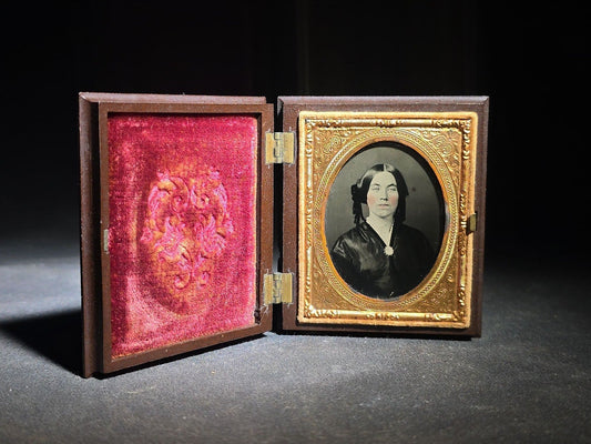 Antique 1/9th Plate Ruby Ambrotype Photograph of a Young Woman with Hand-Tinted Cheeks in Thermoplastic Union Case, Photographed by Davis Brothers, Portsmouth, New Hampshire, 1859