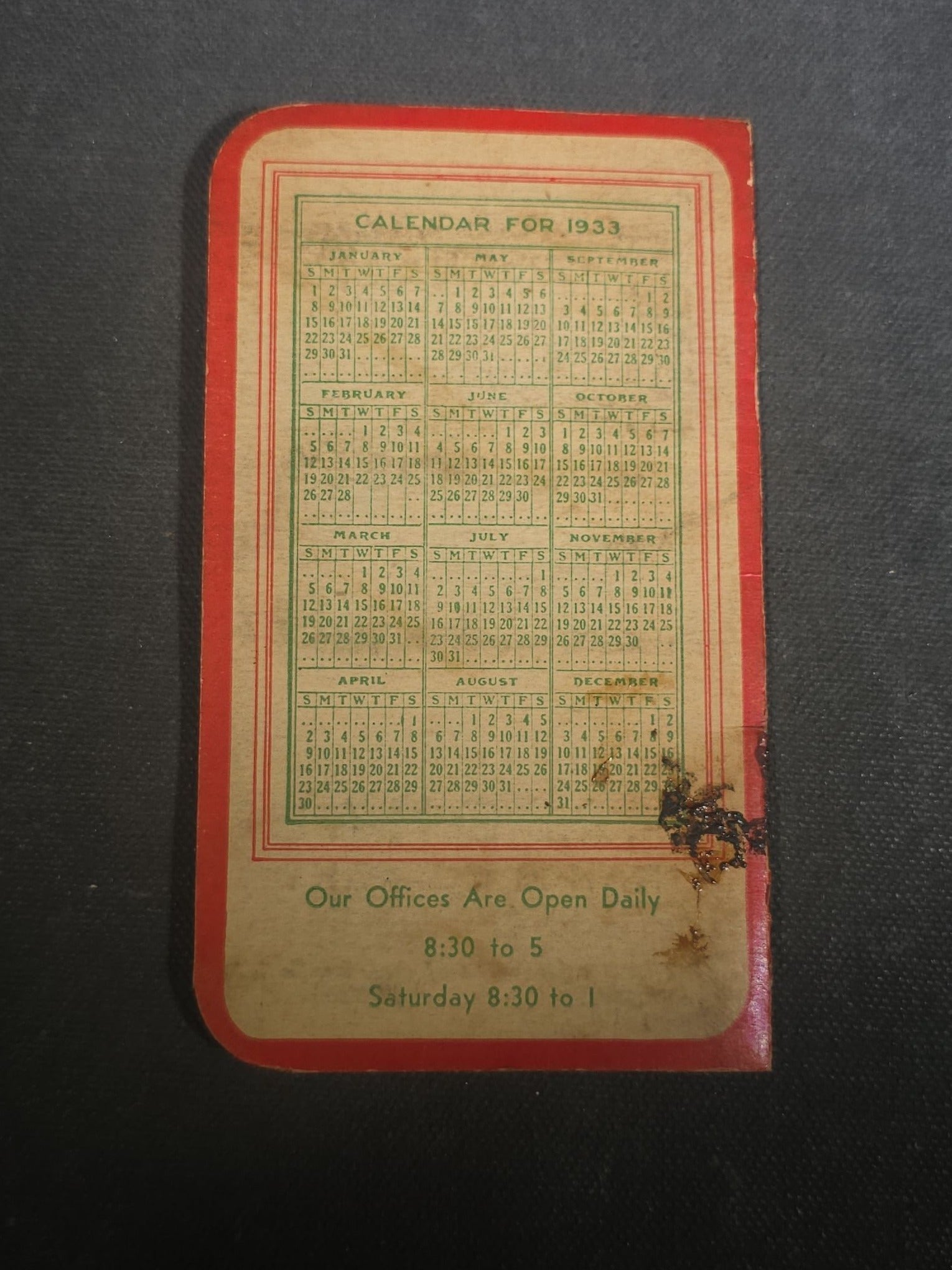 Grouping of Seven Antique and Vintage Christmas Ephemera including Santa Claus with Children in Sleigh R.P.P.C., Quincy Savings Bank Die-Cut Stocking Dime Holder, Personal Finance Company Advertising Needle Case, and Anti-New Deal Humorous Poem
