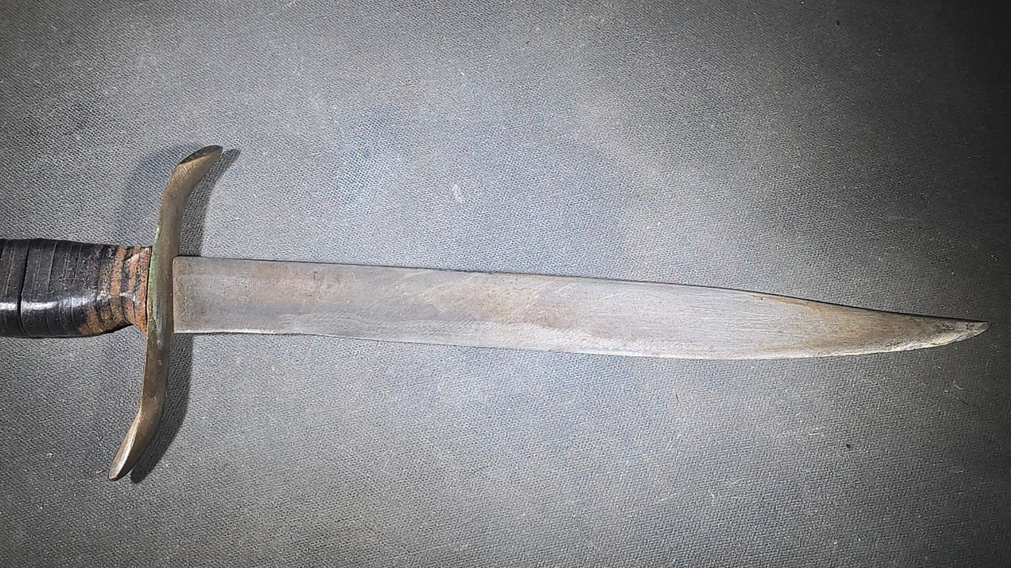 Vintage Bowie-Style Fighting Knife with Stacked Leather Grip, Brass Crossguard and Pommel, and Leather Sheath