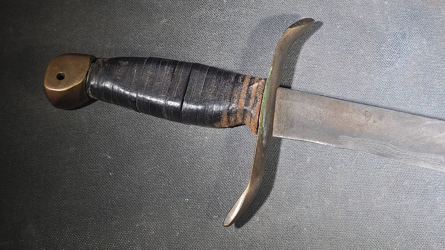 Vintage Bowie-Style Fighting Knife with Stacked Leather Grip, Brass Crossguard and Pommel, and Leather Sheath