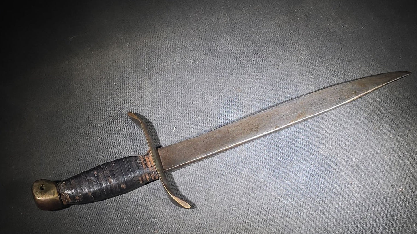 Vintage Bowie-Style Fighting Knife with Stacked Leather Grip, Brass Crossguard and Pommel, and Leather Sheath