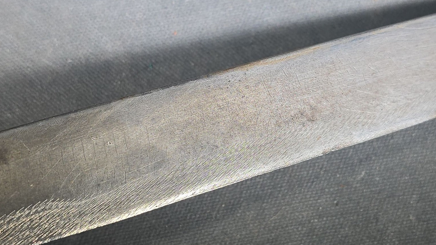 Vintage Bowie-Style Fighting Knife with Stacked Leather Grip, Brass Crossguard and Pommel, and Leather Sheath