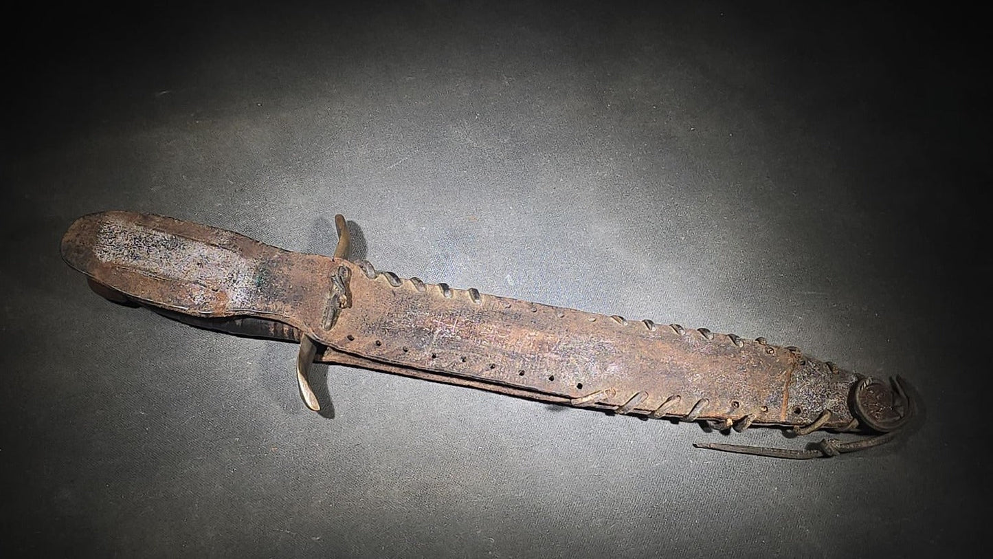 Vintage Bowie-Style Fighting Knife with Stacked Leather Grip, Brass Crossguard and Pommel, and Leather Sheath