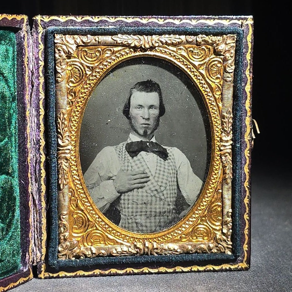 Antique 1/9th Plate Ruby Ambrotype Photograph of a Young Man in Checked Vest and Bow Tie in Full Leatherette Case