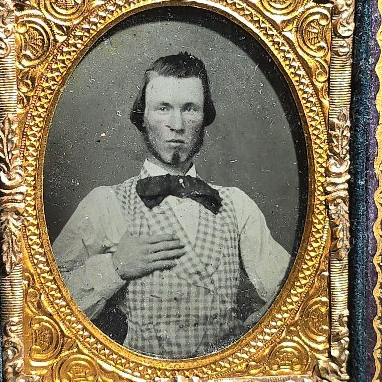 Antique 1/9th Plate Ruby Ambrotype Photograph of a Young Man in Checked Vest and Bow Tie in Full Leatherette Case