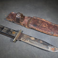 Lot 085 - Vintage Fixed-Blade Knife with Grooved Handle and Leather Sheath, 9" L