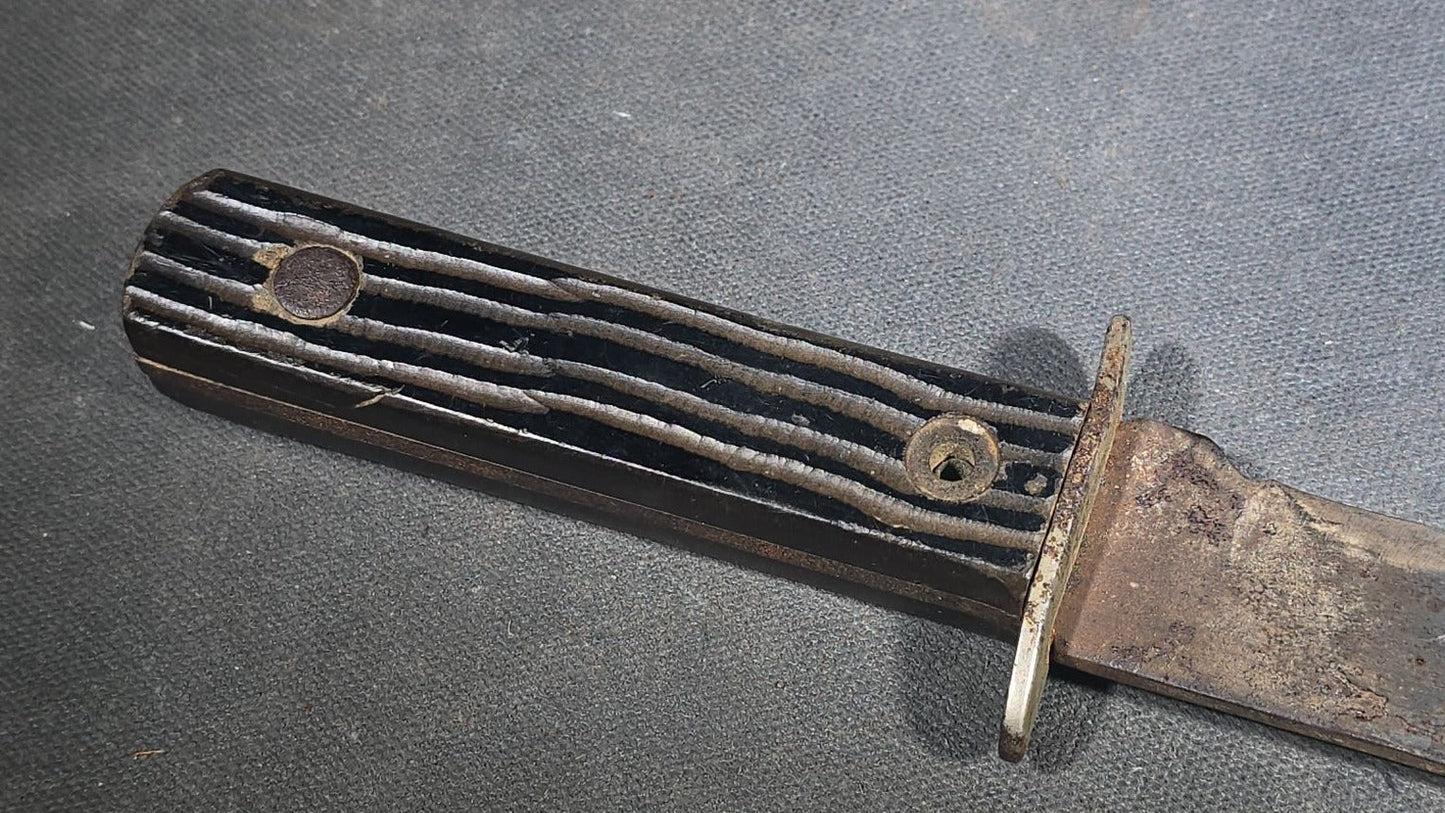 Vintage Fixed-Blade Knife with Grooved Handle and Leather Sheath
