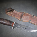 Lot 087 - Vintage Schrade-Walden H-15 Hunting Knife with Stacked Leather Handle and Tooled Leather Sheath, Manufactured by Schrade-Walden, New York, U.S.A., 9-1/2" L