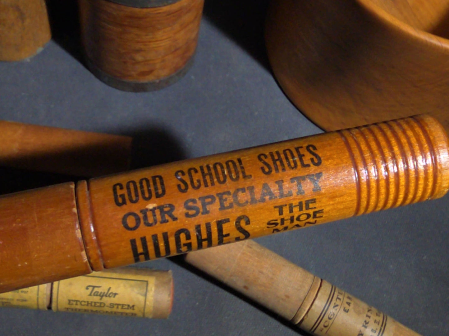 Grouping of Eight Antique, Vintage, and Modern Wooden Smalls Including Hughes "The Shoe Man" Advertising Shoehorn from Dover, New Hampshire, Turned Bowl Signed Jason Szafranski, Taylor Etched-Stem Thermometer, and "Century" Ear Syringe Case