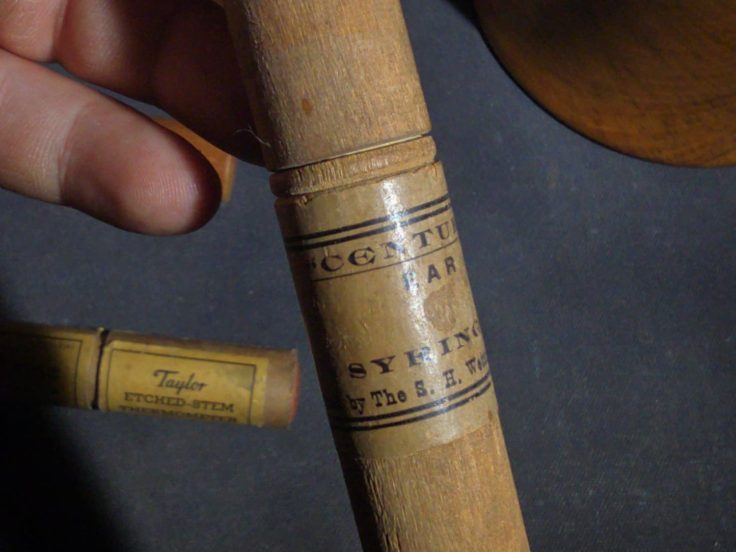 Grouping of Eight Antique, Vintage, and Modern Wooden Smalls Including Hughes "The Shoe Man" Advertising Shoehorn from Dover, New Hampshire, Turned Bowl Signed Jason Szafranski, Taylor Etched-Stem Thermometer, and "Century" Ear Syringe Case