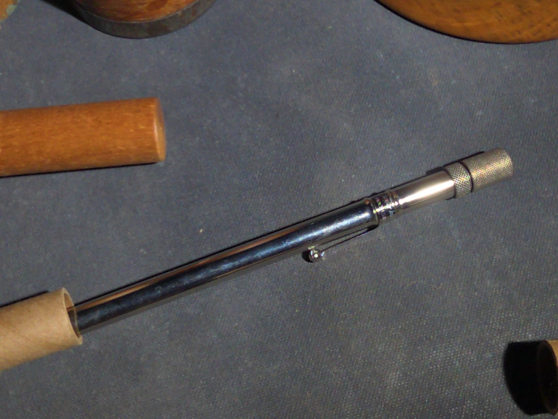 Grouping of Eight Antique, Vintage, and Modern Wooden Smalls Including Hughes "The Shoe Man" Advertising Shoehorn from Dover, New Hampshire, Turned Bowl Signed Jason Szafranski, Taylor Etched-Stem Thermometer, and "Century" Ear Syringe Case