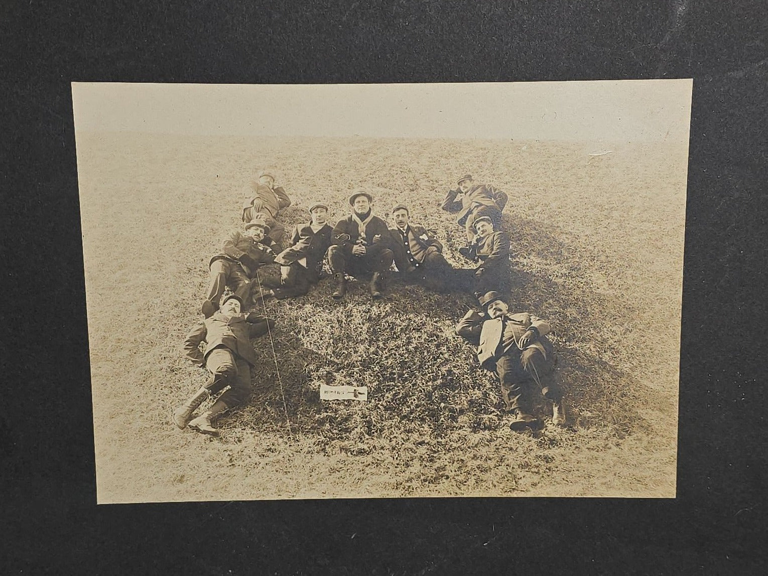 Antique Board-Mounted "Selfie" Photograph of a Group of Men Arranged in the Shape of the Letter "H" with "Hikers" Banner and Cross, Self-Timed Shutter Release