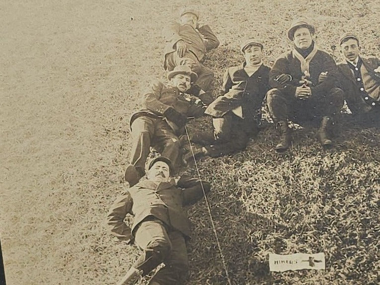 Antique Board-Mounted "Selfie" Photograph of a Group of Men Arranged in the Shape of the Letter "H" with "Hikers" Banner and Cross, Self-Timed Shutter Release
