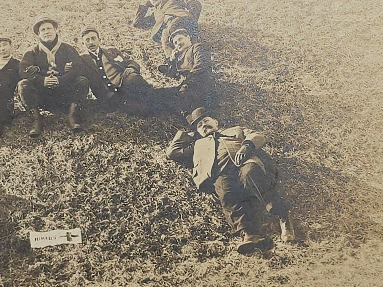 Antique Board-Mounted "Selfie" Photograph of a Group of Men Arranged in the Shape of the Letter "H" with "Hikers" Banner and Cross, Self-Timed Shutter Release