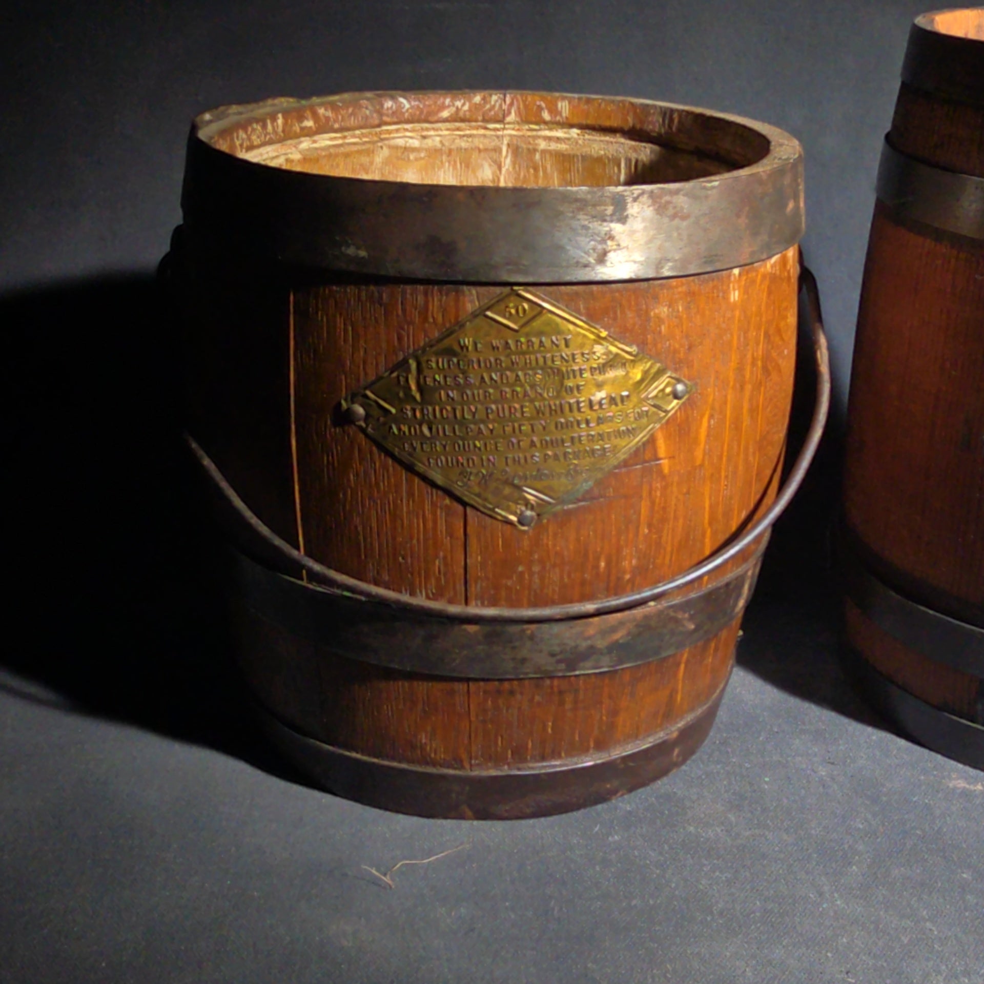 Trio of Antique Wooden Advertising Containers including F.W. Devoe & Co. White Lead Bucket with Brass Plaque, Hamilton's California Kadota Figs Barrel, and Briggs Smoking Tobacco Barrel