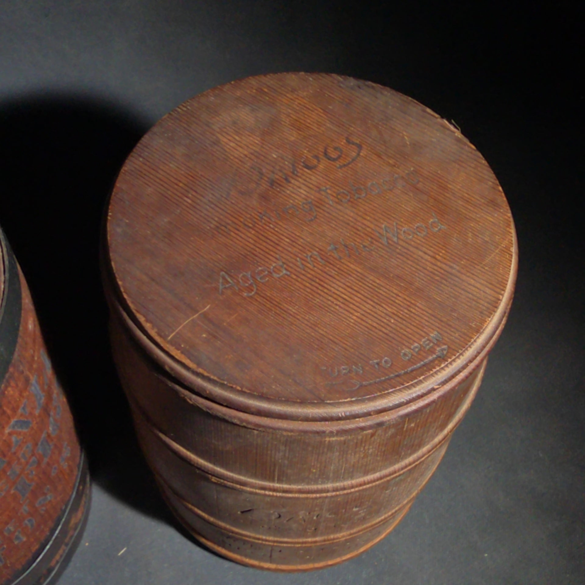 Trio of Antique Wooden Advertising Containers including F.W. Devoe & Co. White Lead Bucket with Brass Plaque, Hamilton's California Kadota Figs Barrel, and Briggs Smoking Tobacco Barrel