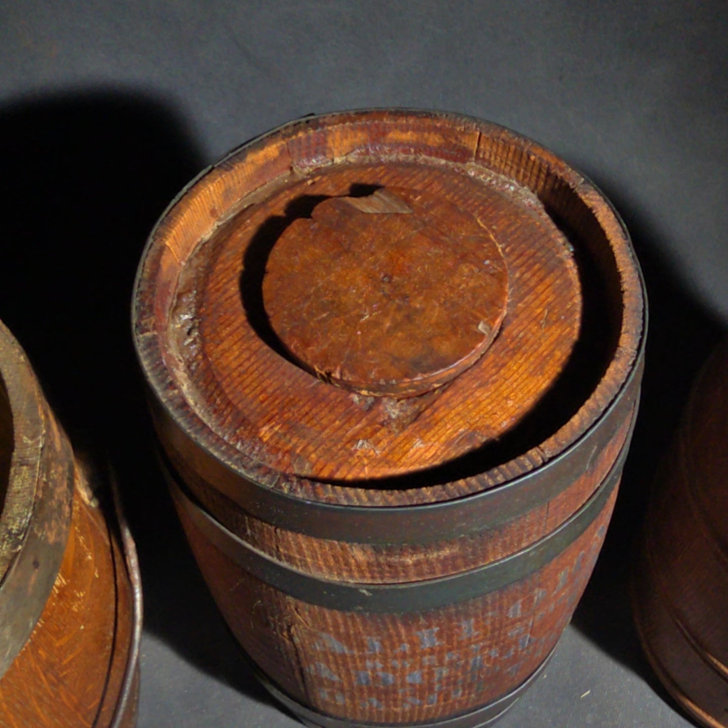 Trio of Antique Wooden Advertising Containers including F.W. Devoe & Co. White Lead Bucket with Brass Plaque, Hamilton's California Kadota Figs Barrel, and Briggs Smoking Tobacco Barrel