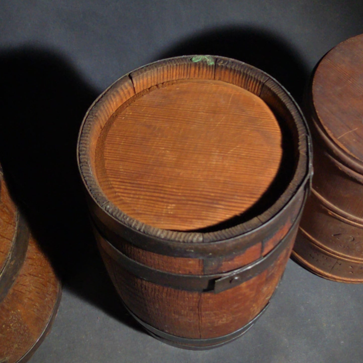 Trio of Antique Wooden Advertising Containers including F.W. Devoe & Co. White Lead Bucket with Brass Plaque, Hamilton's California Kadota Figs Barrel, and Briggs Smoking Tobacco Barrel