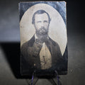 Lot 087 - Antique Leather Panotype Photograph of a Bearded Man in Suit and Vest