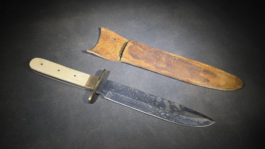 Antique Bowie-Style Knife with Bone Handle Scales, Brass Crossguard, and Leather Sheath