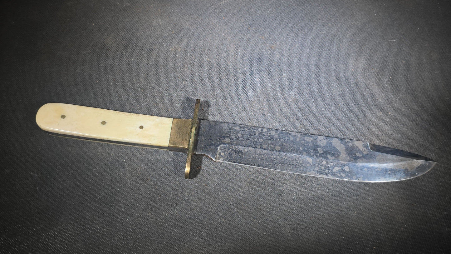Antique Bowie-Style Knife with Bone Handle Scales, Brass Crossguard, and Leather Sheath