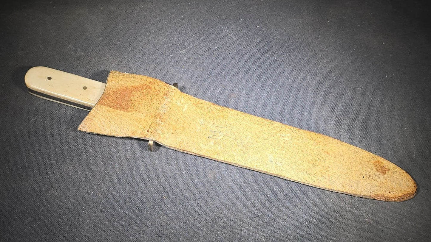 Antique Bowie-Style Knife with Bone Handle Scales, Brass Crossguard, and Leather Sheath