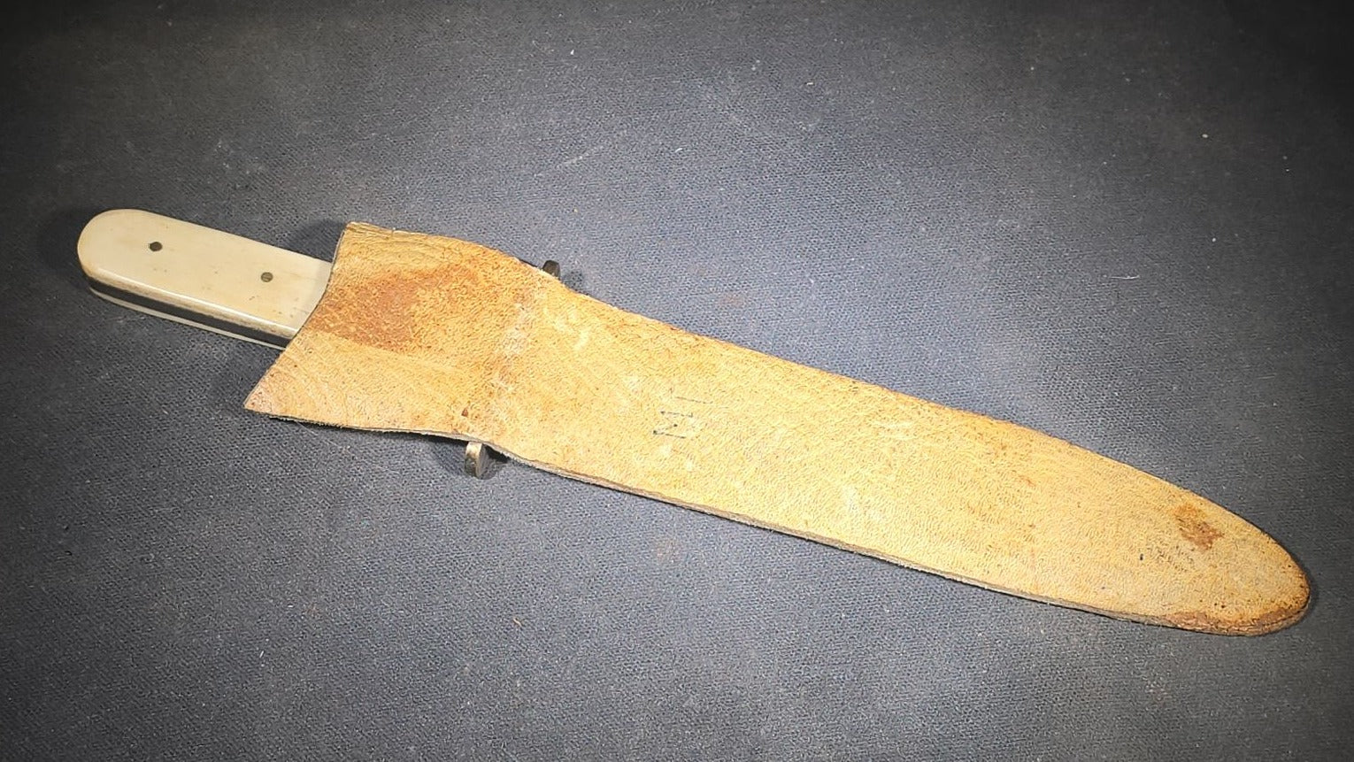 Antique Bowie-Style Knife with Bone Handle Scales, Brass Crossguard, and Leather Sheath