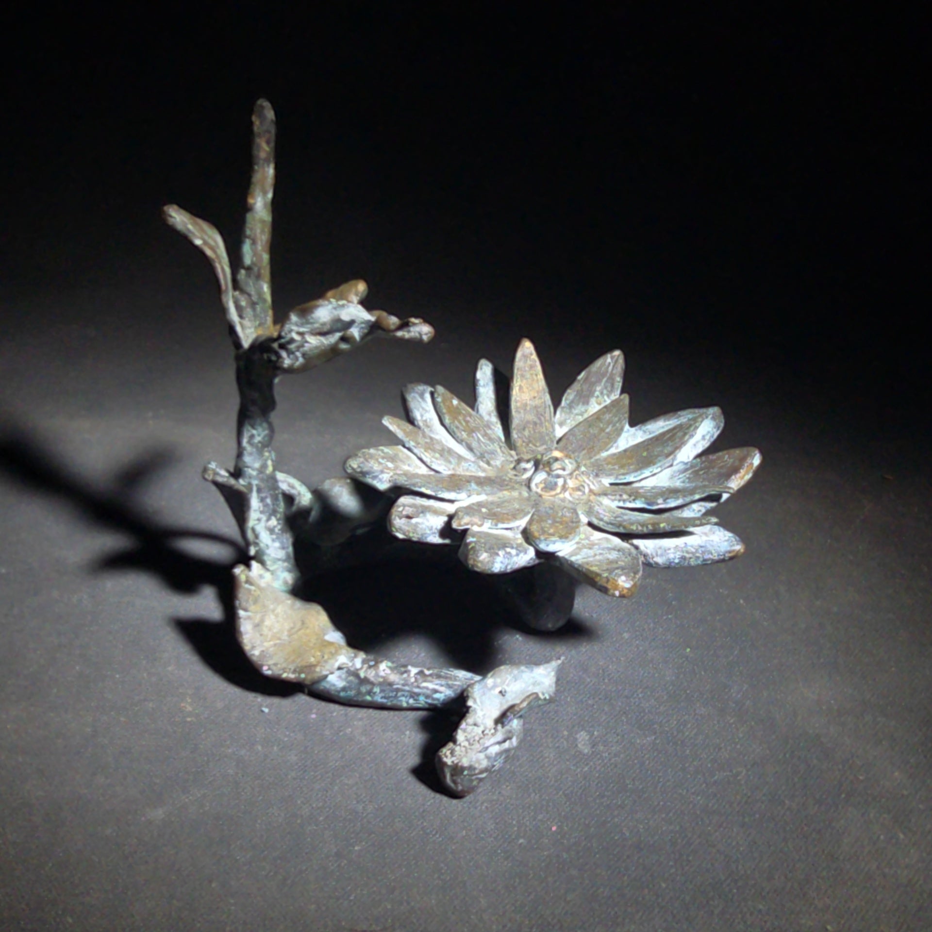 Vintage Bronze Floral Sculpture Stand with Open Bloom and Leafy Branch