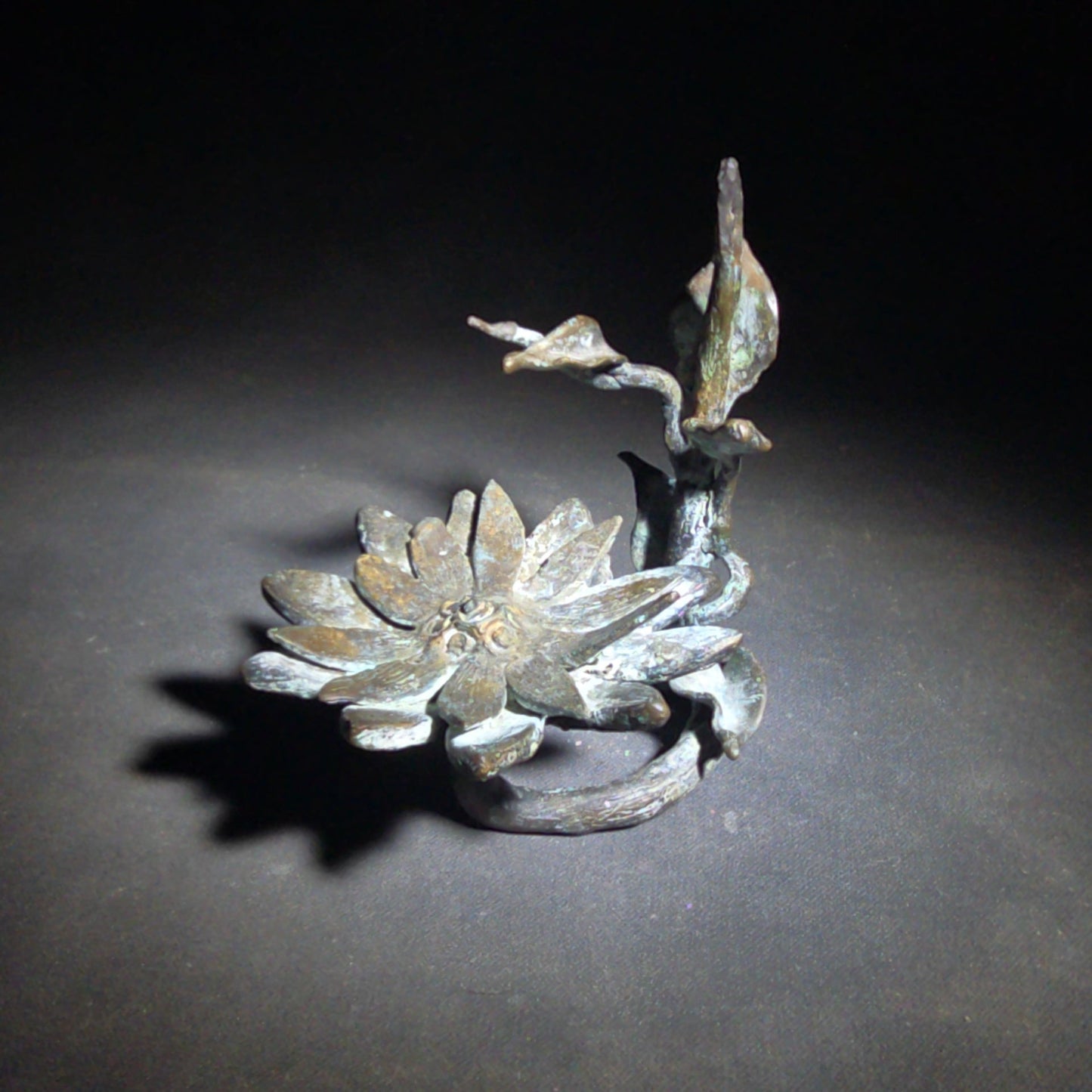 Vintage Bronze Floral Sculpture Stand with Open Bloom and Leafy Branch
