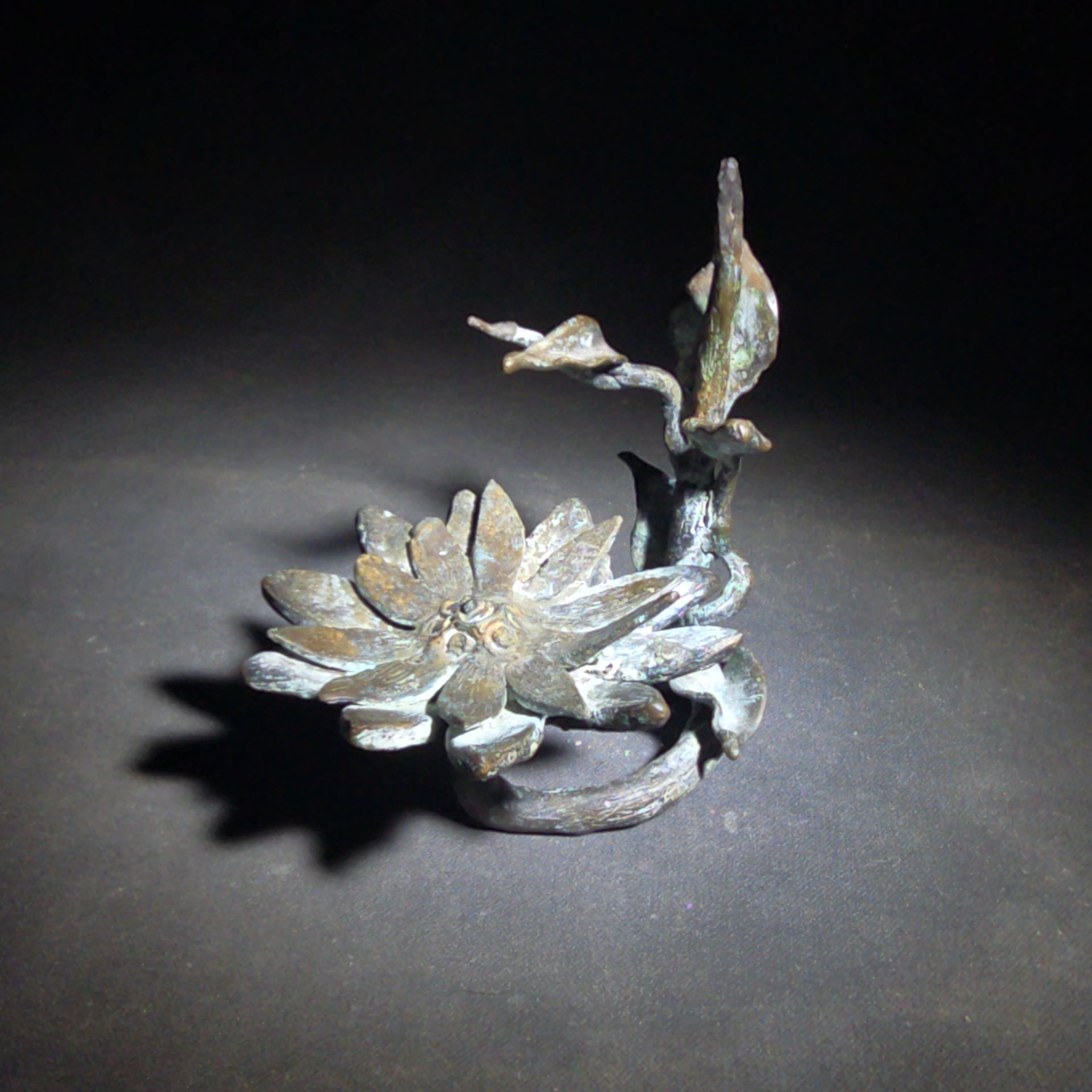 Vintage Bronze Floral Sculpture Stand with Open Bloom and Leafy Branch