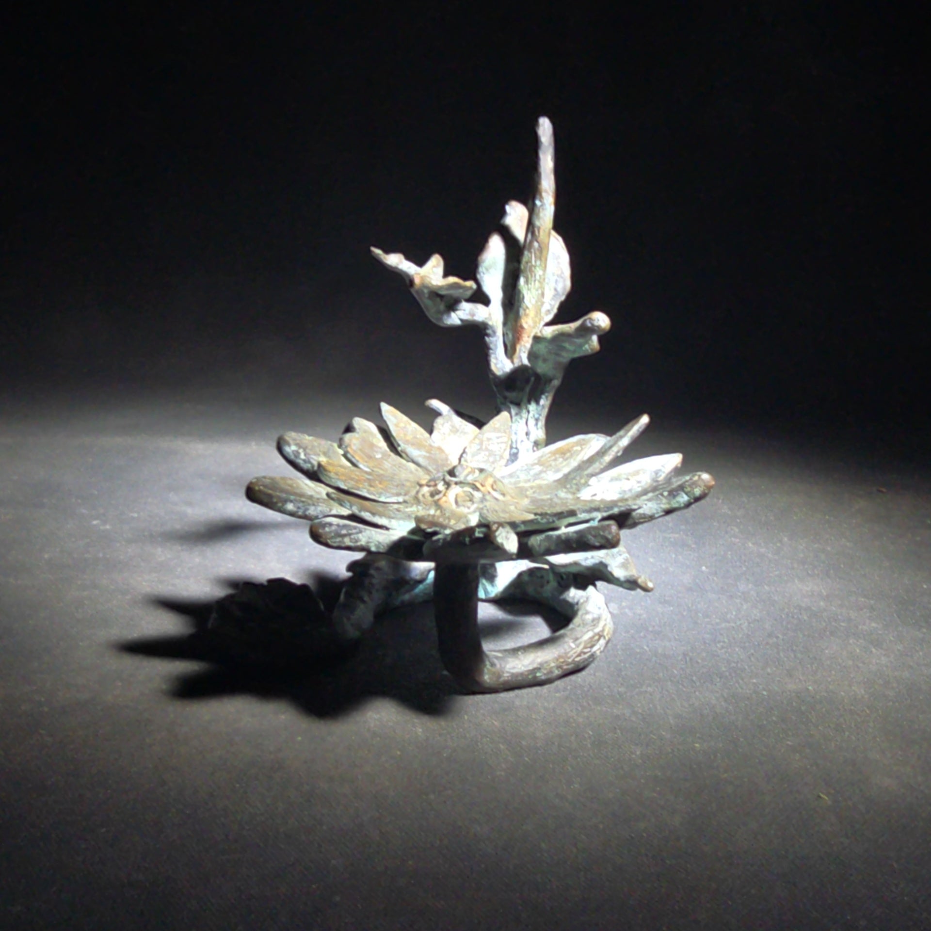 Vintage Bronze Floral Sculpture Stand with Open Bloom and Leafy Branch