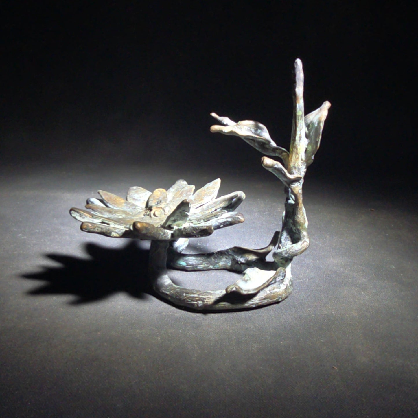 Vintage Bronze Floral Sculpture Stand with Open Bloom and Leafy Branch