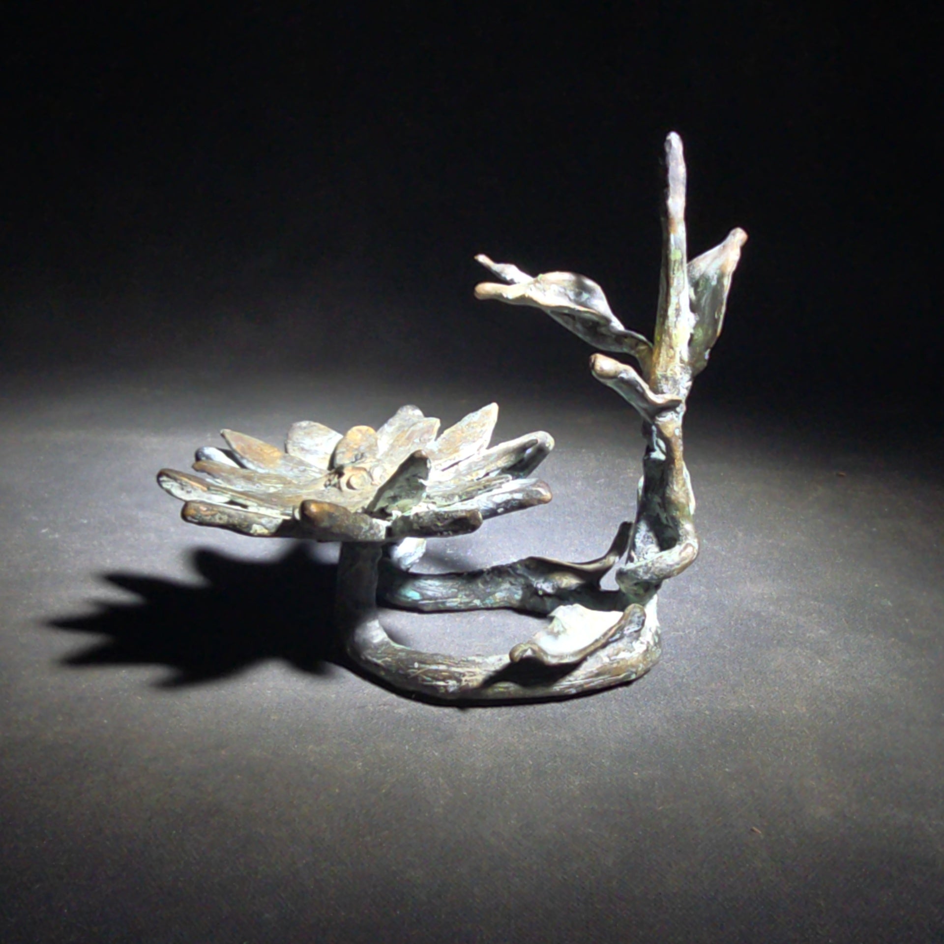 Vintage Bronze Floral Sculpture Stand with Open Bloom and Leafy Branch