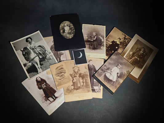 Grouping of 12 Antique and Vintage Photographs including Crescent Moon Snapshot, Rock Formation C.D.V., Child with Doll Cabinet Card by Schloeder, and Girl with Hoop Cabinet Card by Neale, Tremont, New York