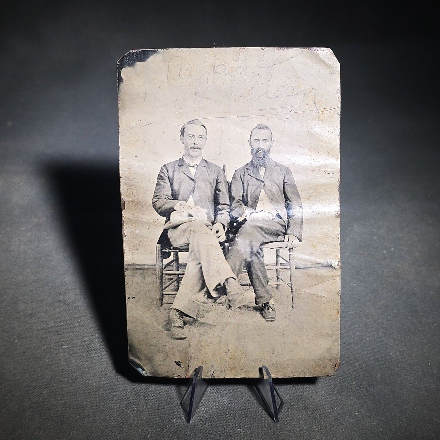 Grouping of Four Antique Tintype Photographs Including Two Seated Men with Pencil Inscription and Three Men in Top Hats