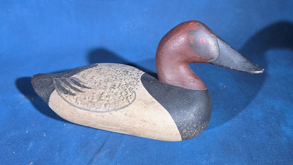 Grouping of Four Vintage Hand-Carved and Hand-Painted Duck Decoys including Canvasback Signed Capt. Harry R. Jobes and Scoter Carved J.H. Whitney