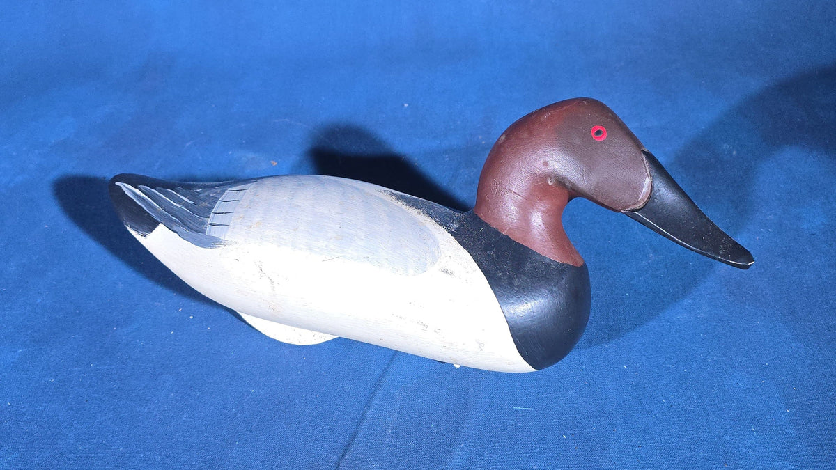 Grouping of Four Vintage Hand-Carved and Hand-Painted Duck Decoys including Canvasback Signed Capt. Harry R. Jobes and Scoter Carved J.H. Whitney
