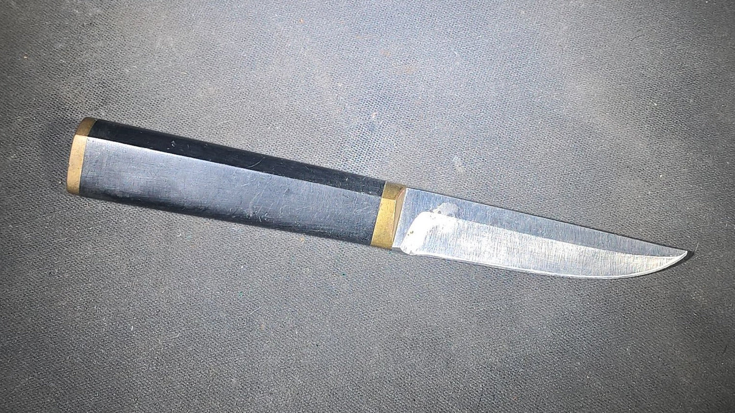 Grouping of Four Vintage Fixed-Blade Knives including Marble's Stacked Leather Handle Knife, Stag Handle Knife, and Bone Handle Dagger