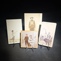 Lot 093 - Grouping of Four Antique and Vintage Photographs Including C.D.V. Family Portrait with Cat, WWI Soldier R.P.P.C., Board-Mounted Musicians with Violin and Banjo, and Snapshot of Child Cowboy