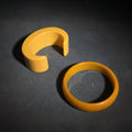 Lot 060 - Pair of Antique Butterscotch Early Plastic Bangle Bracelets Including Closed Bangle and Open Cuff